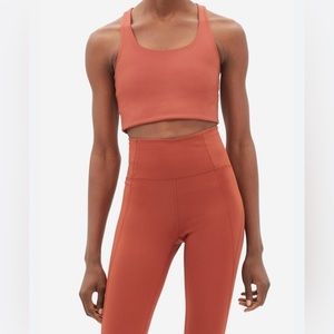 Girlfriend Collective Paloma Racerback Sports Bra in Burnt Orange Size L